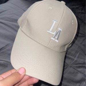 I am selling an LA hat. It is so beautiful but never had a chance to wear it.